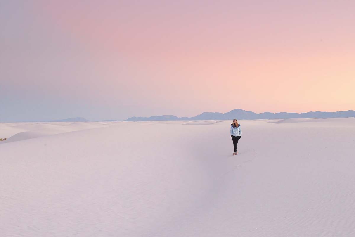 united states person standing in middle of snow field backgrounds